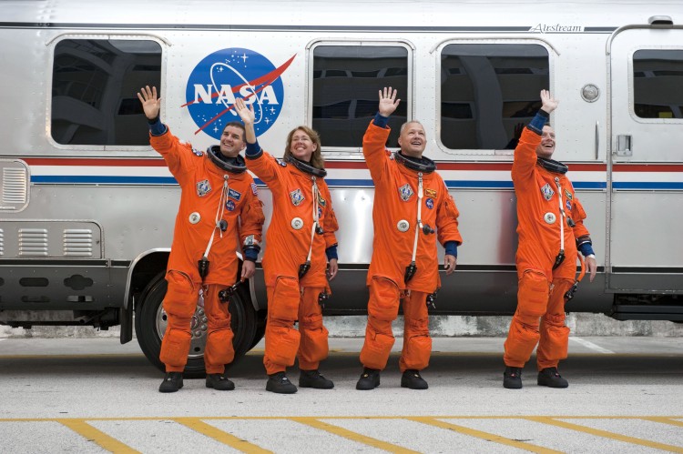 STS_135_crew_wave_farewell_before_the_launch.jpg